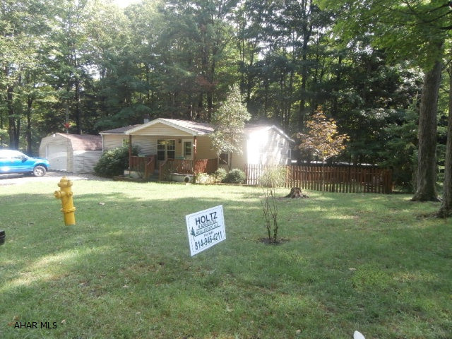 Well maintained doublewide on corner lot. Move in condition includes eat in kitchen and fireplace in living room, 3/4 bath off the master bedroom. Great property for the money.