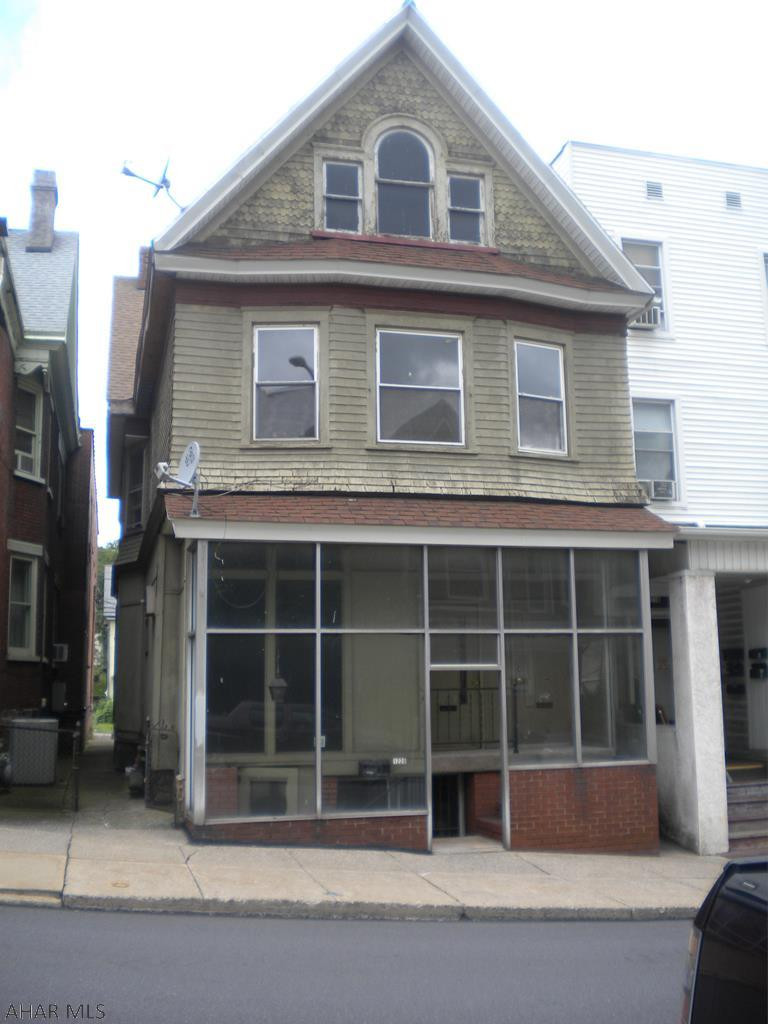 Investors come take a look at this great  income making potential opportunity! 3 unit apartment building offering two 2 bedroom 1 bath units and a three bedroom 1 bath unit. Also a partially finished attic.  Each unit includes a stove and refrigerator. Off street parking in the rear. Separate heat and electric. First floor has air conditioning units.