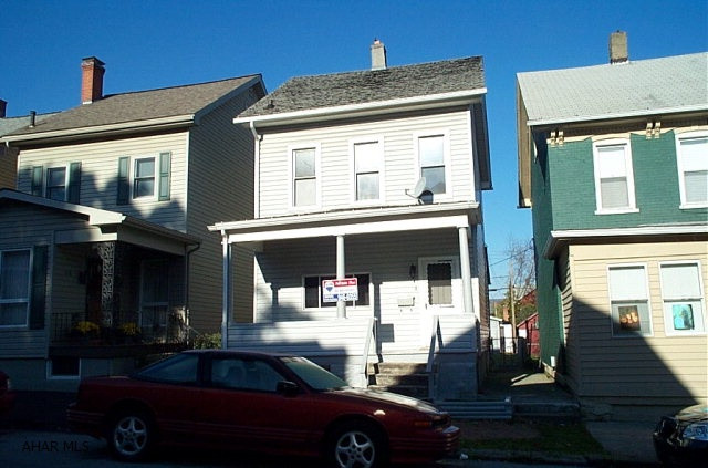 Vinyl sided 2 BR, 1 BA with hot water heat. Fully insulated with many newer windows. 2 car detached garage. Owner will entertain reasonable offers.