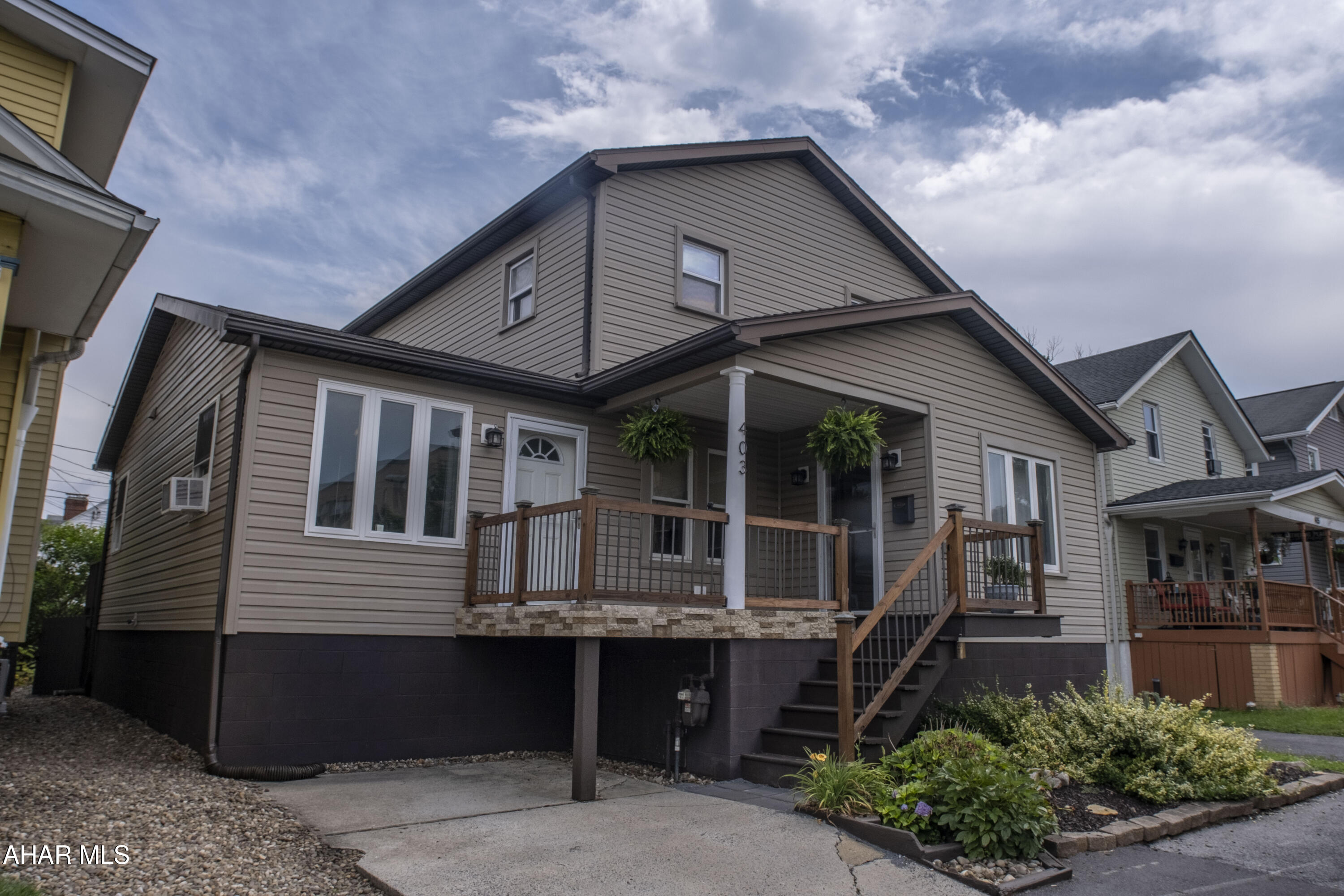 Space, flexibility, and a layout that's hard to find--welcome to 403 Hemlock Street. Offering over 2,200 square feet, this Garden Heights two-story features 5 bedrooms with the potential for a 6th, giving you the freedom to create a home that fits your lifestyle. The first-floor primary suite includes its own full bath and private entrance, making it ideal for guests, extended living arrangements, or simply a little extra privacy. Upstairs, you'll find three additional bedrooms, a second full bath, and the convenience of a dedicated second-floor laundry room. Out back, the fenced yard offers plenty of room to relax or entertain with two spacious decks and a storage shed. Conveniently located just minutes from I-99, shopping, restaurants, and everyday amenities, this home combines space, versatility, and location in one package.