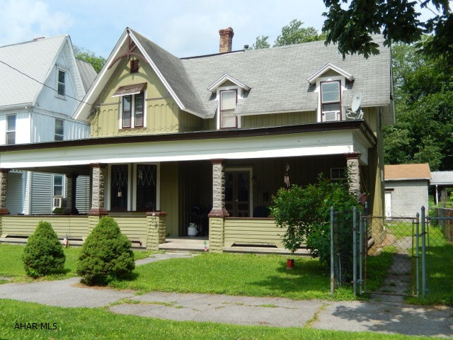 Beautiful Historic Victorian home. This home used to be a duplex (currently a single family) Great potential, the property could easily add a 2nd floor bath upstairs. The plumbing is roughed in and ready to go! Nice lot, garage out back, wrap around porch. Bellwood Antis School District. MUST CALL LISTING AGENT PRIOR TO SHOWING. (NO RAILING ON 2ND FLOOR)