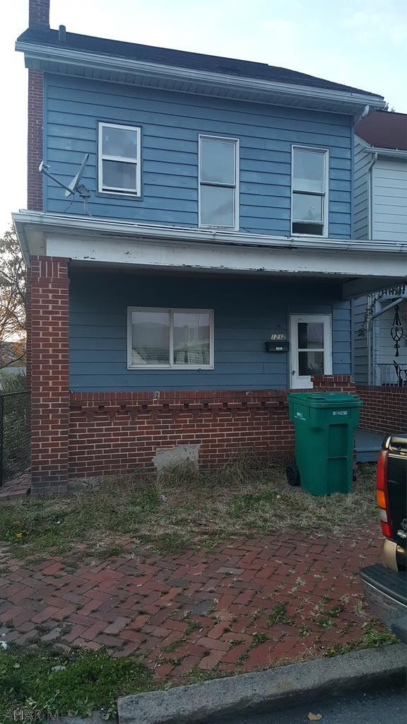Welcome investors!  Come check this property out, perfect for rental income and owner occupancy!  The front unit is a 3 Bedroom, 1 Bath single family home.  Attic can easily be converted into a 4th bedroom!  Featuring high ceilings, huge rooms, and special built in details, this home needs a little bit of fixing up to make it shine!  Above the detached garage is a charming two bed, one bath apartment.  Rent out both units or supplement your income while fixing up your new home!