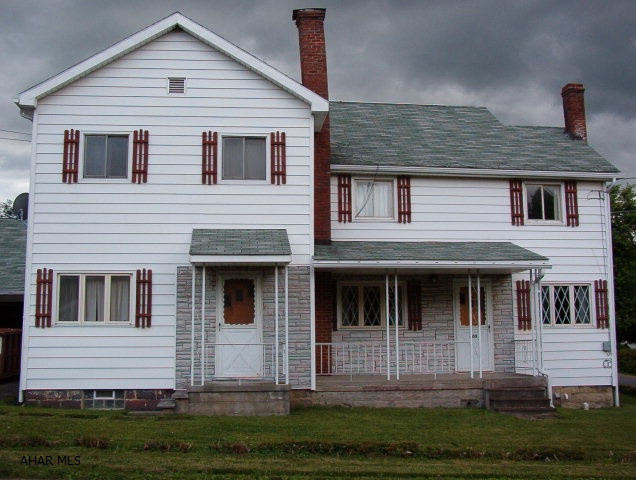 Great opportunity.  Live in one side and rent the other.  Large yard, detached 2-car garage and additional carport.  Tenant is friend of the family and was never charged full rent.  Lease is month to month.