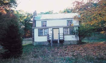 2 Story log home on 3.37 Cute antique log house with vinyl siding.