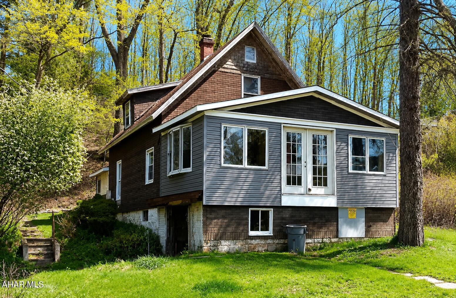 Check out this fixer-upper in East Taylor Township featuring 2 bedrooms and 2 baths. This home offers a very open floor plan and sits on over a quarter-acre lot, providing plenty of space both inside and out. While it does need some improvements, it presents a great opportunity to bring your vision to life and create the home you've been looking for.