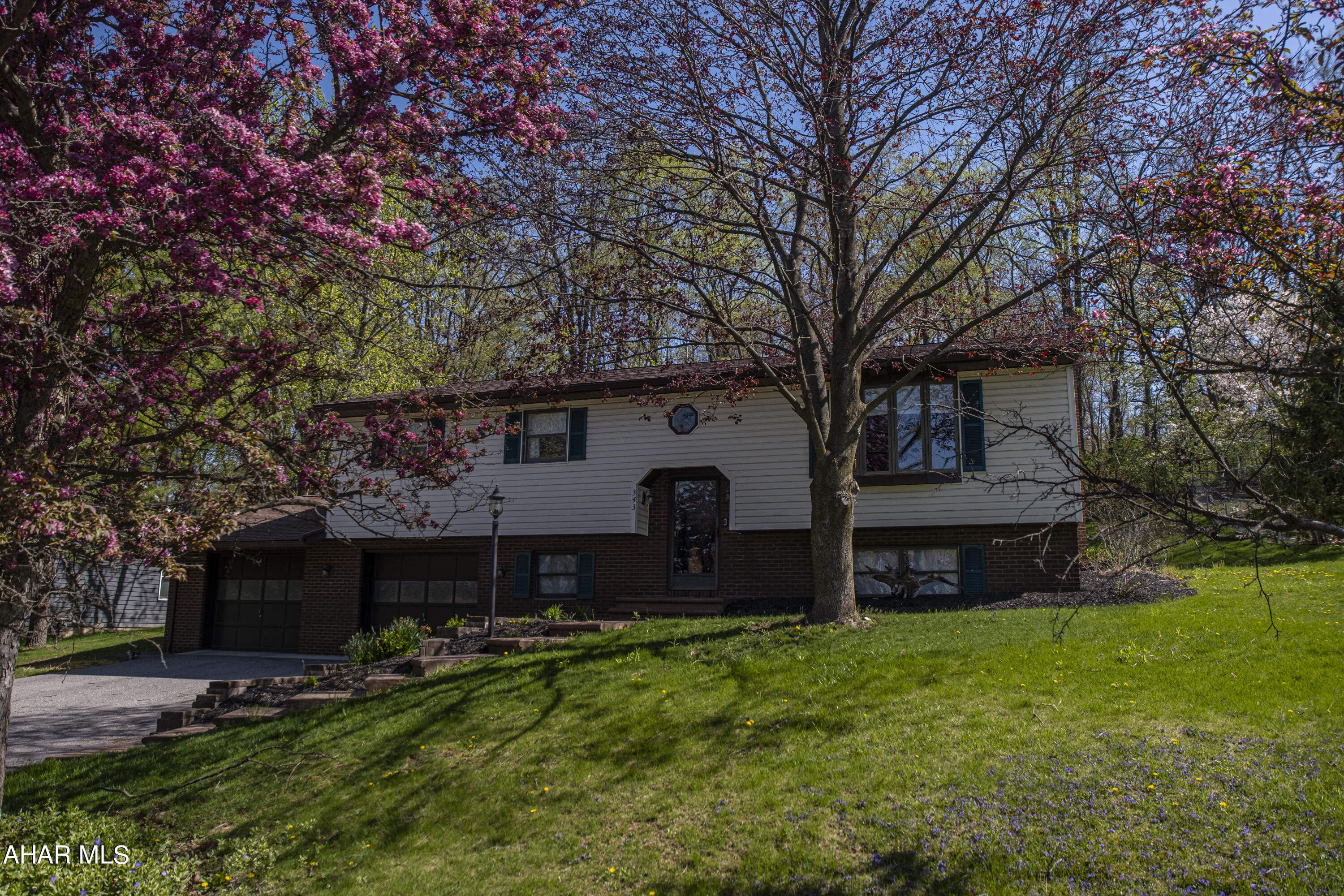 Welcome to this beautiful home located in the sought-after Rolling Hills development in Hollidaysburg, PA! This stunning property sits on a .27 acre lot and boasts 3 spacious bedrooms, each providing ample space and comfort for rest and relaxation.

The open concept design of this home is perfect for entertaining guests and creating lifelong memories.

One of the many highlights of this property is the spacious two-car attached garage, complete with additional space for storage and workspace. This garage is perfect for storing vehicles, tools, and any other equipment you may need.

The rolling hills of this development provide a serene and peaceful environment, perfect for unwinding after a long day.

This home is perfect for anyone seeking a spacious and comfortable living space in a peaceful and serene location. Don't miss out on this incredible opportunity - schedule a viewing today!