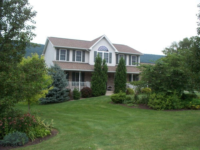 Great view of mountains & golf course. Very nicely landscaped. Peaceful & quiet area close to Canoe Creek State Park & State Game Lands. Newly painted interior. Clean home. Lower level family room with great view, bar, surround sound, etc. Open front porch, rear deck & patio. Walk to Canoe Creek.
