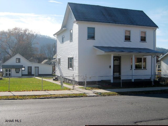 Beautiful home, nothing to do but move in. Beautiful three season room on back of home. 3 car garage with one bay closed off for workshop. Finished room in garage with heat and electric, shed, nice large level fenced lot. Convenient to grocery store and public transportation.