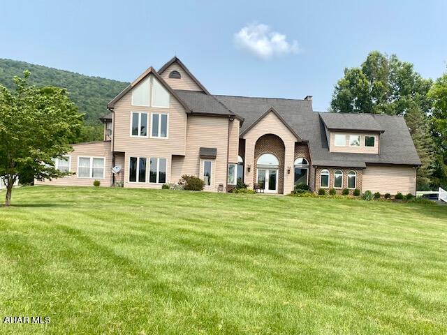 This exquisite property spans over 7.3 acres. 5 Bedroom, 5 Bath custom home overlooking a stocked fish pond with a beach area, waterfall, gas fire pit and dock. The large gourmet eat-in kitchen, first floor master suite and sun room were all remodeled in 2021. The first floor has heated floors, remote control shades, and an elevator that will take you to the second floor bedrooms. A bank barn has been converted to an entertainment and recreational facility with 7 large screen TV's that are included. Barn also has bar area, sauna, basketball court, wolleyball court, offices on lower level. WAY TOO MANY extra features and amenities to mention. This is a must see property. Qualified buyers only.