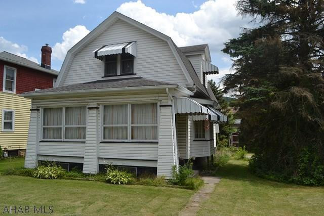 Exciting East End opportunity that you don't want to miss!  This 3 bedroom home sits on a corner lot with off-street parking and one of the biggest living rooms you'll find.  First floor has eat-in kitchen with hardwood floors, a nice-sized dining room, and the very large living room space.  Upstairs are 3 bedrooms, each with built-in storage/dressers, as well as a full original bath.  The basement has a toilet and stand-up shower.  All appliances stay with property.  This is a real gem and a case where a little sweat equity will go a long way!  Great neighborhood, double corner lot, vinyl-sided exterior.  Call for your showing today.