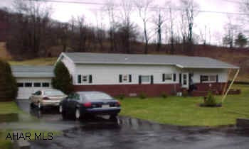 1 story home. A small portion of the original mobile home still exists. Much of the home is built around that. Neat but novel room layout. 3 levels and a basement. Third bedroom in basement. Home is in good condition. Kitchen was remodeled one year ago.