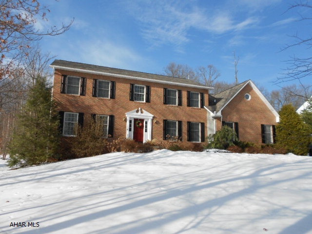 This 2 story home offers an updated kitchen with stainless steel appliances, granite counter tops. High ceilings, large bedrooms. Family room off the kitchen with fireplace. Finished basement. Screened in porch with wrap around deck. Heated in ground pool 16x32. Property in wonderful condition.