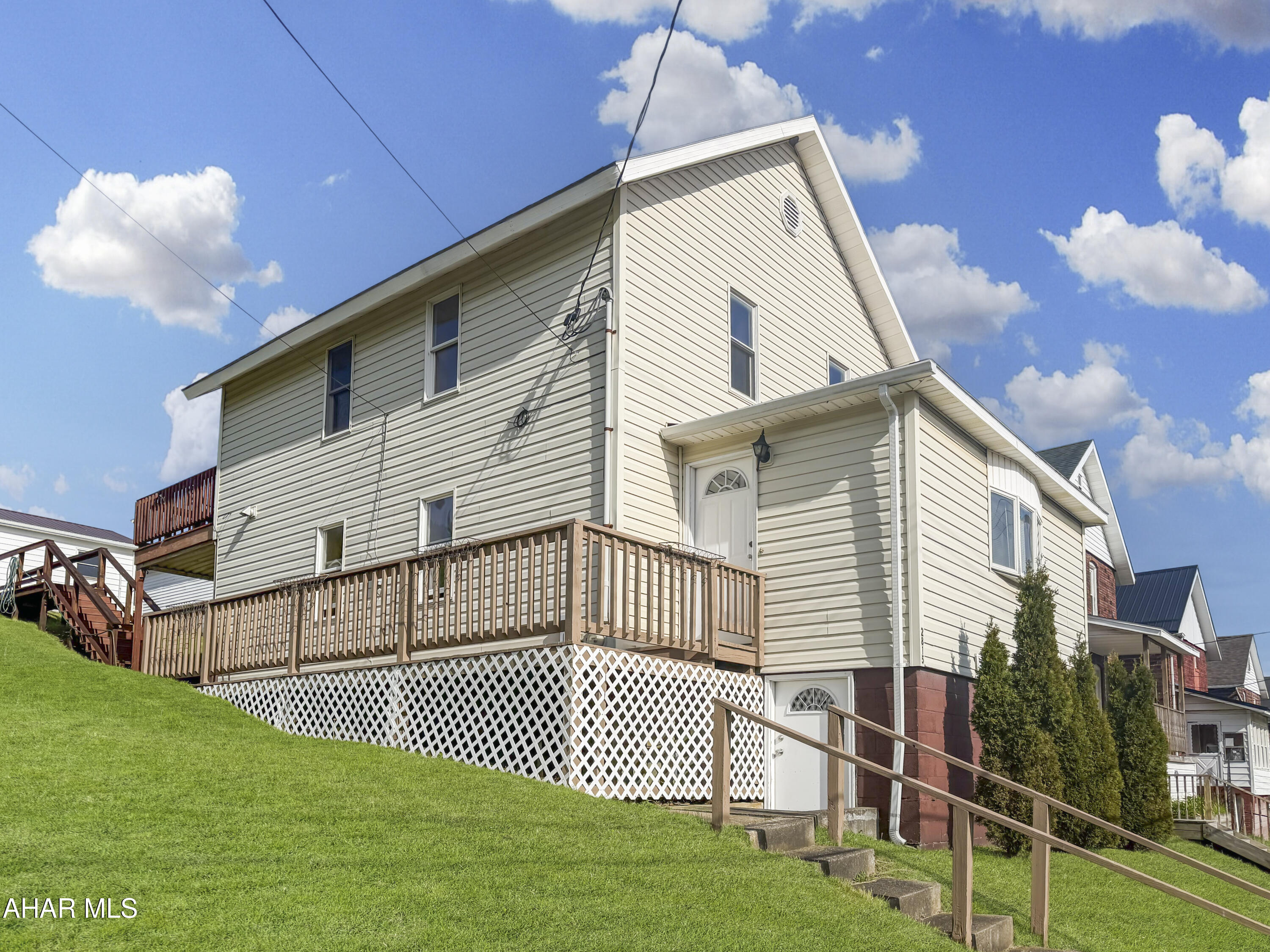 Welcome to 2815 Bigler Avenue in Northern Cambria! This well-maintained home offers plenty of space, functionality, and charm throughout. The main floor features a spacious kitchen, dining area, updated full bathroom, large living room, and an additional bonus room perfect for a home office, playroom, or extra living space. The second floor offers 3 nicely sized bedrooms, including one with sliding glass doors leading to the rear deck. The basement is unfinished but provides excellent storage space and houses the laundry and mechanicals. Outside, you will find a spacious yard, off-street parking, side porch, concrete patio, and a large rear deck ideal for relaxing or entertaining. The detached 1-car garage includes power, making it perfect for a workshop or hobby space. Call today to schedule your private tour!