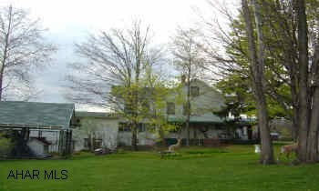Spacious home beautiful landscaped lot, (fenced 272x124) Living quarters for in-laws.
