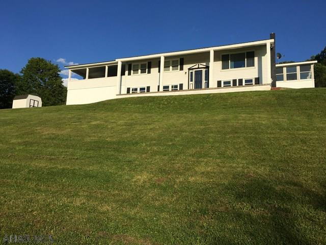 Live in Scotch Valley for under $200,000 with a view to die for. This 3 bedroom, 2 bath home sits on 1.01 acres and offers a partially finished basement with a family room, dry bar, and a bonus room that could be used as a 4th bedroom. there is a wood stove in the basement for back up heat and this home has new windows, roof and a large carport for 2 cars. Workshop under carport for the handyman. Located minutes from Canoe Creek and all the amenities the city of Altoona has to offer.