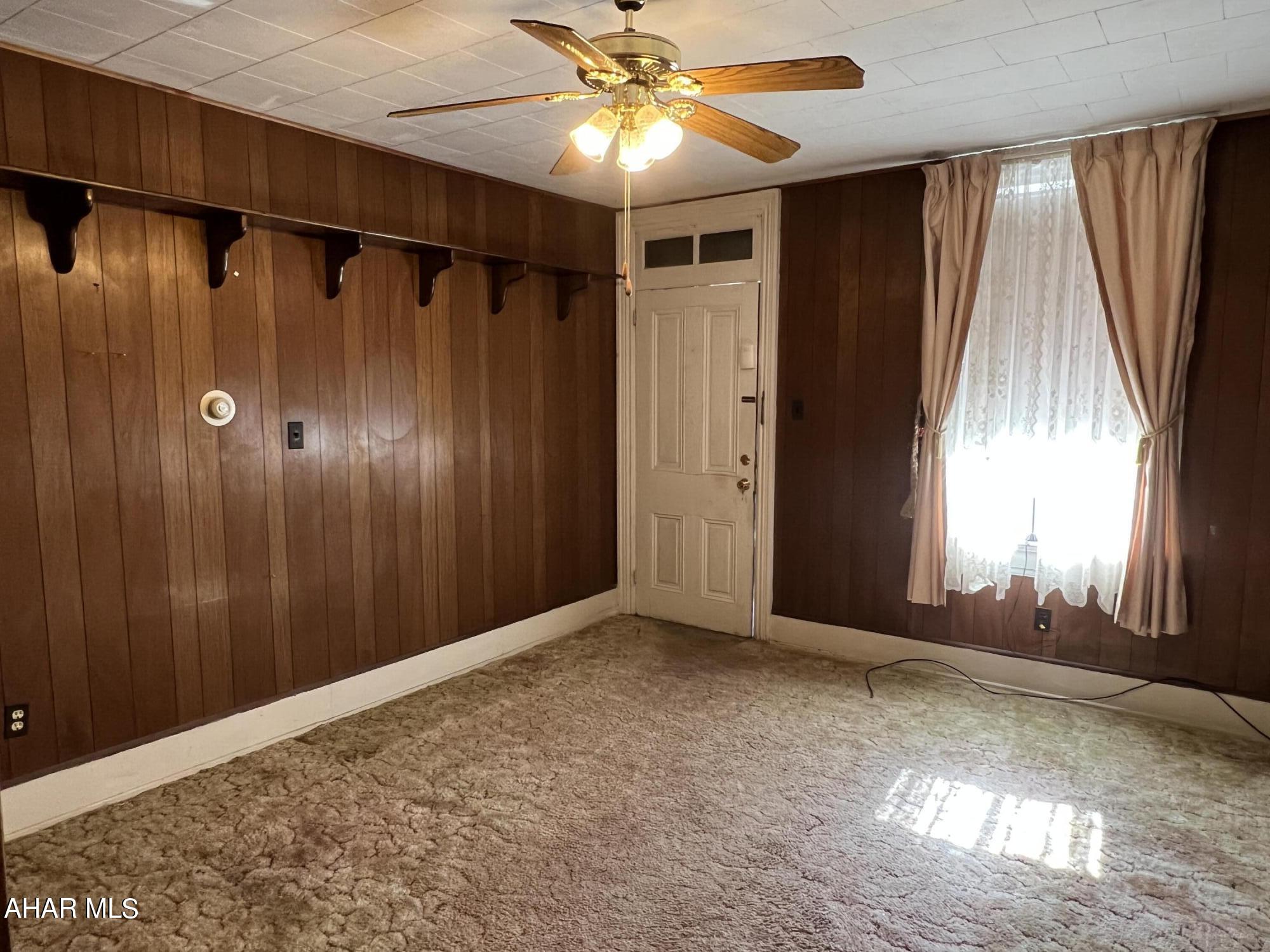 Location! Location! Location! This property is in the well sought-after Hollidaysburg borough, one block from Courthouse, and all within proximity to everything the Downtown area has to offer.  This home was used as a family home. The one half of the home features a 2 BR and 1 Bath and a 1 BR 1 Bath on the other side. There are separate areas in the basement for Storage, Laundry  and a walkout basement.  The seller's estimate the roof installed approximately in 2018, A/C 2007, and a refrigerator purchased in 2019. Water and septic on one bill, and 110 Amp individually serviced to each unit. There is plenty of POTENTIAL for this property: Single Family Home, Duplex, live on one side and rent the other side to a family member to help with your mortgage payment. In addition, This home has an alley behind the house for off street parking and a nice flat lot! What are you waiting for? Give us a call to schedule an appointment!