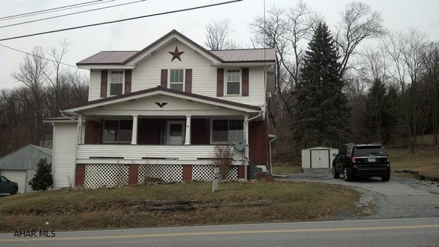 All inspections have been completed and corrections made for buyer! This home has great potential with a country view! Oversized family room addition, private patio, dog kennel, shed. The home needs finishing work but is a great starter home for the handyman!