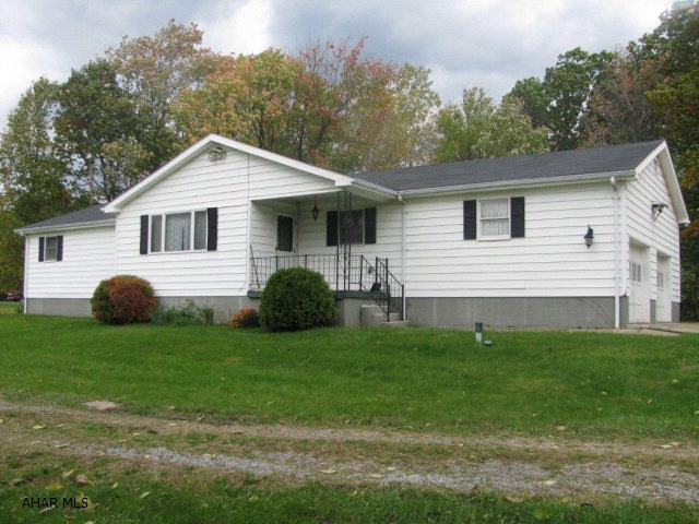 Spacious Bellwood ranch on over 1 acre!! This home offers large lining room w/ brick fireplace, dining room, EIK. w/snack bar and huge pantry closet, 1st floor laundry, master bedroom w/full bath plus 2 more large bedrooms and hall bath! Full basement w/brick fireplace w/ wood burner insert offers more room to expand! attached 2 car garage completes this home!