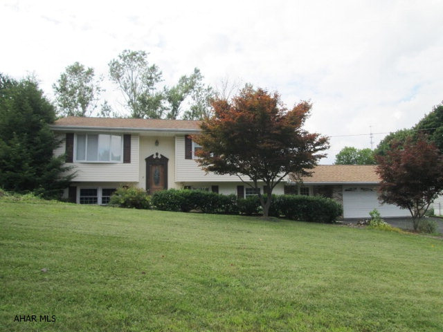 East End - Large bilevel on .5 acre lot with tons of potential.  In 2006 this home had new HVAC unit, new hot water tank, new 200 amp service, new windows & new siding. All appliances, 3 TV's with surround systems, dinette table and family room couch are included. There is some deferred maintenance and that is reflected in the price.