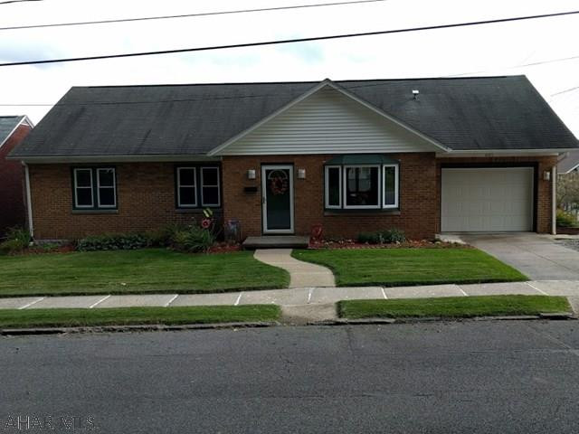 MOVE IN READY!  Enjoy the warm, relaxed ambience of this 3 BR home that features an updated kitchen with new counter tops and gas range, living room with electric fireplace, hardwood floors throughout, and all freshly painted. The master bedroom has two closets and includes a wall-hung TV.  This home boasts a finished recreation room in the lower level with an open floor plan that includes a kitchenette. Adjacent to the rec room is a 3/4 updated bathroom, laundry room and plenty of storage space. The large back porch will surely enhance social gatherings and features an outdoor fan and new carpeting.  Large fenced-in back yard that is all landscaped. Gas Heat/Central Air. One-car garage with extra space along driveway. Walking distance to town and recreation areas. Must see this home!