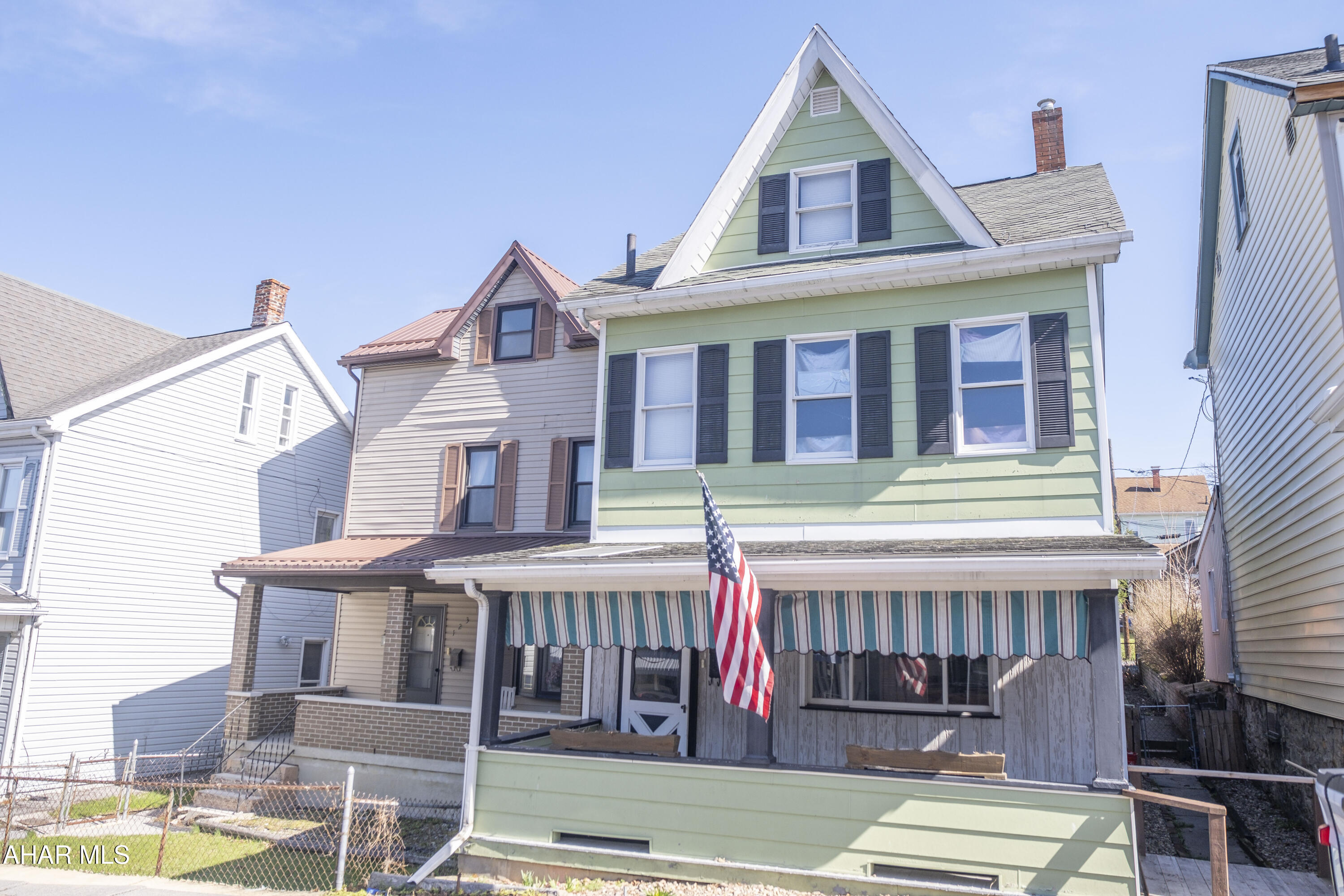 Affordable 2-bedroom, 1.5-bath traditional home in the City of Altoona with potential for a 3rd bedroom in the walk-up attic! This home offers 1,278 square feet of living space and plenty of opportunity. The main level features a spacious living room with a stone accent wall, a formal dining room with ceiling fan, and a large eat-in kitchen with a skylight that brings in natural light. A convenient first-floor laundry area with half bath adds everyday functionality. Upstairs includes two bedrooms--one with double closets--and a full bath. The walk-up attic provides excellent storage or could be finished for a third bedroom, office, or additional living space. Additional highlights include a full walk-out basement, fenced yard, covered porch, and off-street parking for two or more vehicles. Located in the Altoona Area School District.