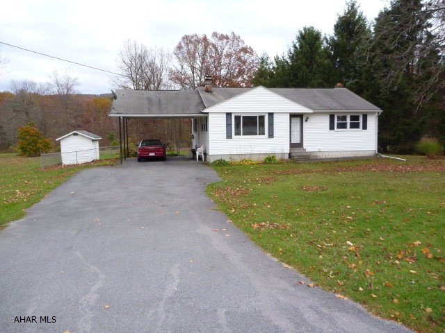 Looking for a home in Bellwood-Antis School District with at least an acre of ground? Look no more. Don't delay in checking this 3BR/1BA Ranch home on 1.32 acres out!! Partially fenced, Shed, Carport, newer windows, hardwood floors, new door, updated bath and wood fireplace are just some of the perks this home has to offer. So much potential and is waiting for your love. Not to mention the basement could be additional living space. Agent is related to seller.