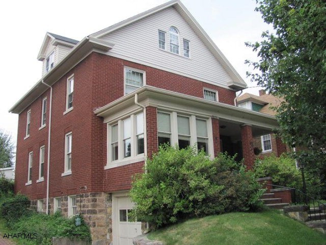 Elegant home with beautiful hardwood throughout. This spacious 4-5 bedroom home with 3 baths sits on a sizeable lot in the heart of Ebensburg. Highlights include a large welcoming living room, a stately hardwood-accented dining room, off-street parking in the private alley and integrated 1-car garage, and an impressive third floor master suite overlooking the town. The sun porch in the front and sleeping porch in the back complement the home's theme of flexible coziness. Major recent updates in this historically well-maintained residence include 3 stories of refinished original wood floors, a wood burning fireplace with efficient insert, and whole-house insulation. This move-in-ready home is priced to sell!