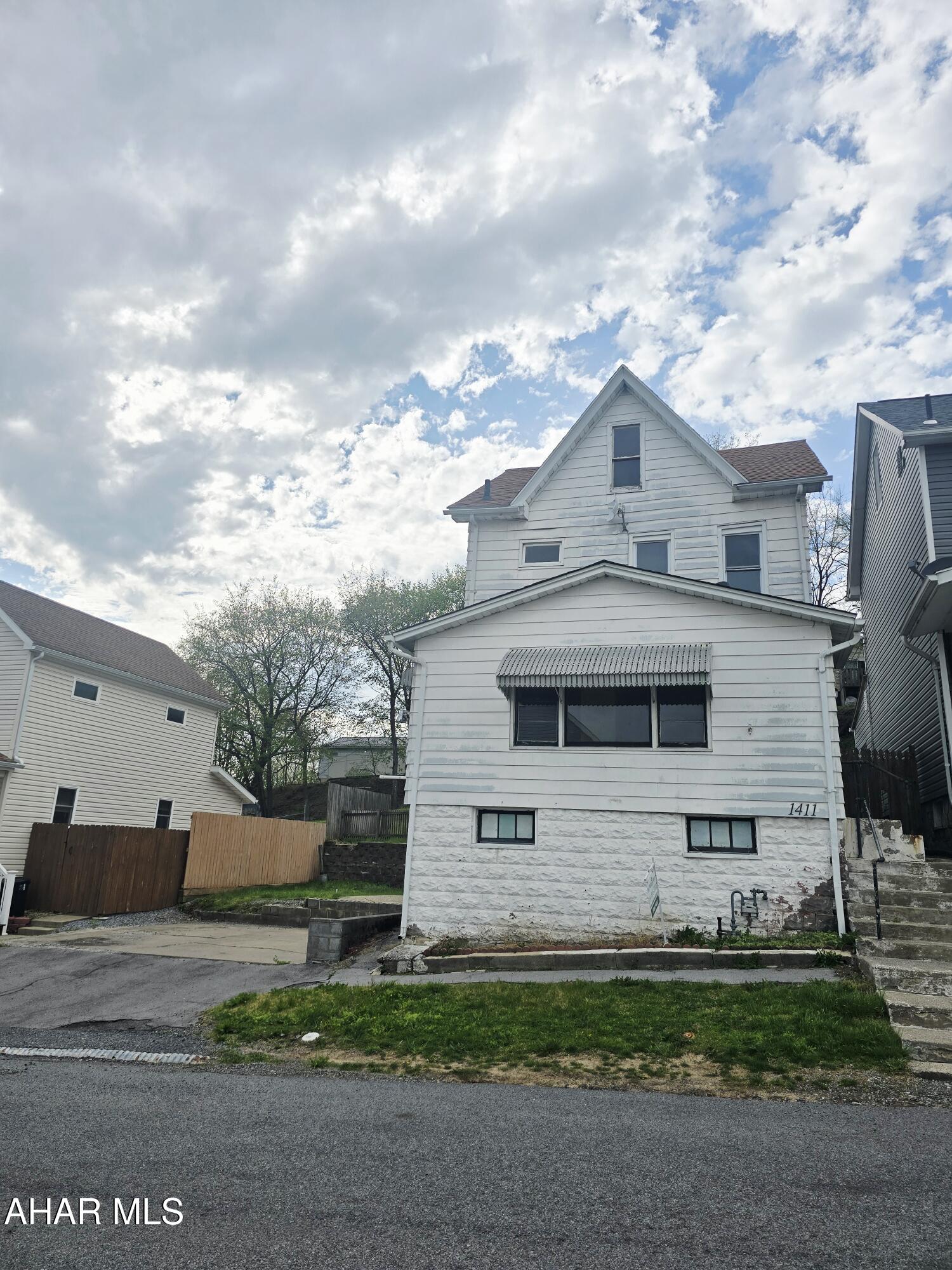 This newly updated 4-bedroom, 1-bath home features a living room with hardwood floors, a formal dining room and a large kitchen that includes an eat-in area. The main floor also provides a dedicated laundry area and mudroom. 3 of the bedrooms are located on the 2nd floor along with the full bath. The 4th bedroom is located in the finished attic and could also be used as a home office or for additional storage. The sale includes an additional 25x120 parcel, which provides off-street parking and extra yard space. Schedule your tour today!