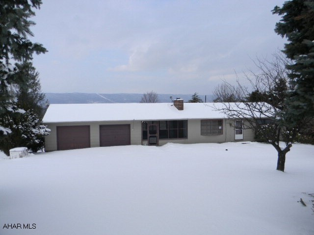 Nice 3BR/2 1/2BA Ranch on 1 acre with 2-car garage. Also, a basement Rec Room, in-ground pool and changing room with bath. Featuring an extended rear view, adjacent to Lake Raystown public land and just 1/2 mile from the 7 Points Recreational Area access gate. Offered AS-IS. Financed offers require BAC pre-qual, cash ofers require proof of funds. Free credit report and appraisal if financed through BAC. VA ADDENDUMS REQUIRED. Better hurry on this one!