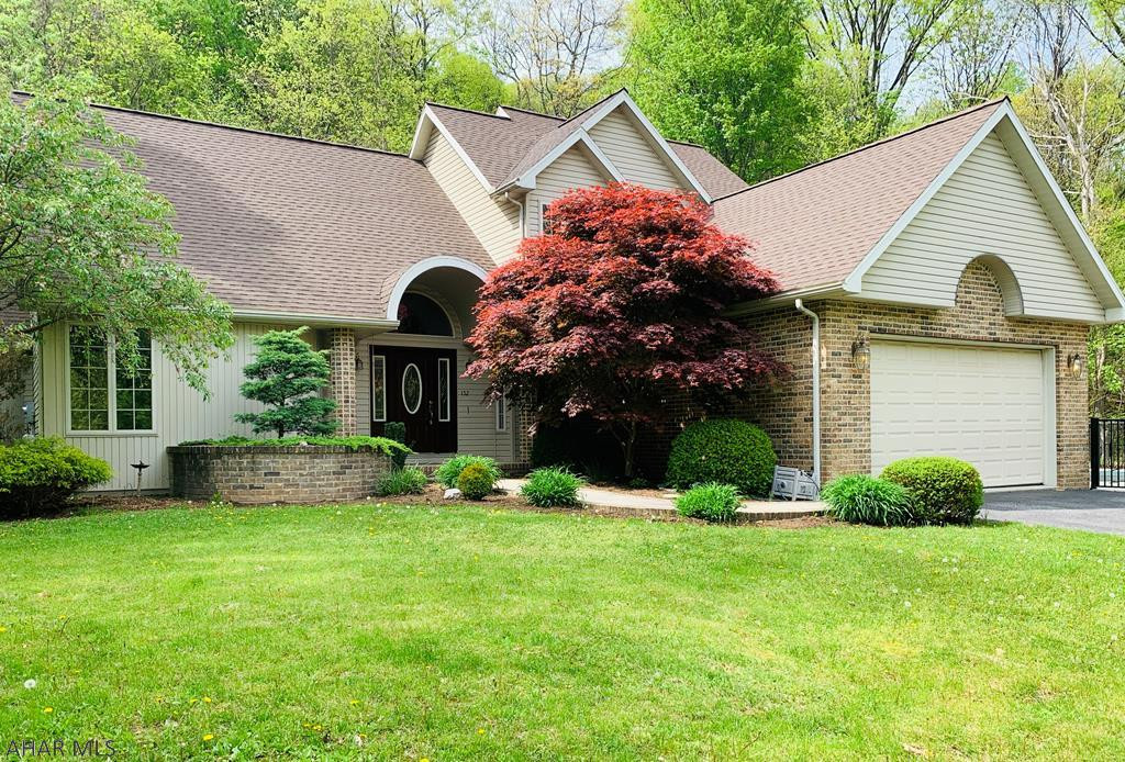 This custom built 3 bedroom, 3 bath home on 2 acres located between Bedford Springs and the town of Bedford is hard to find.  Architectural features like curved walls, cathedral ceilings, spacious walk in curved shower, tray ceilings, walk outs from both kitchen & master bedroom and floor to ceiling brick fireplace make this home unique.  Kitchen is conveniently located next to laundry, garage and family room with walk out to back terrace and pool.  If privacy is important, this home will not disappoint.  Very rare find so close to town.