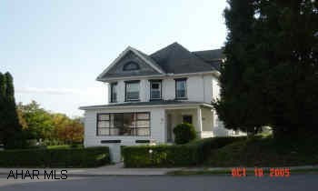 East End Large Brick home. Front sunroom. Rear enclosed porch & deck. Main level laundry. Large lot.
