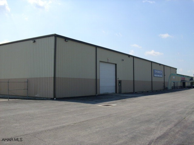 Pole sign visable from I-99.  Retail and warehouse.  Warehouse rack system included in sale.  Three unit steel building.  One space occupied.
