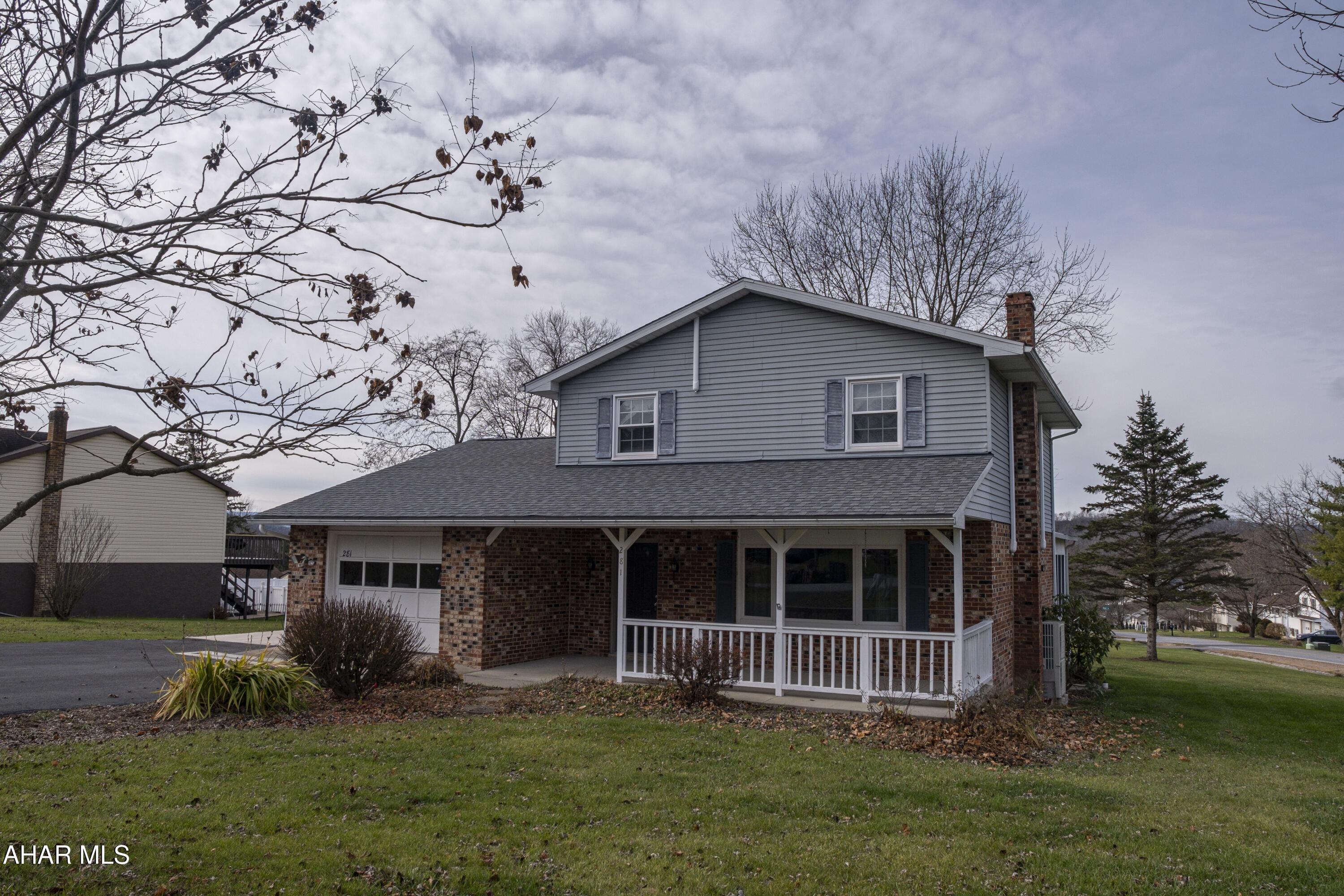 Big Price Reduction!. Welcome to this charming 3-bedroom, 2-bath home nestled in the desirable Rolling Hills neighborhood of Hollidaysburg where you can rock your day away on the front porch. This residence offers ample living space, featuring a comfortable living room, a dining room, a well-appointed eat-in kitchen, a versatile den, and a spacious family room with a gas fireplace. In addition to a traditional hot air heating system and heat pump, the home has had 5 mini-splits installed to make for comfort at all levels.  Step outside to discover a firepit and magnificent 15' by 30' gazebo with a slate patio underneath, and a delightful three-season room, perfect for outdoor entertaining and relaxation.