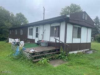 Mobil home has a septic system and drilled well. Owner has the right to rent back the home for 90 days after closing for $300.00/month.