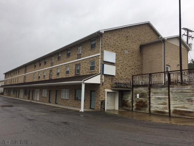Three story commercial building on main thoroughfare.  Elevator to all floors.