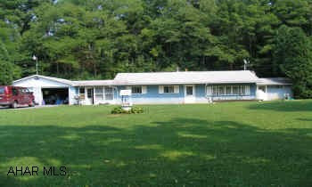 Walking distance to Spruce Creek, close to Little Juniata River.  Perfect for the fisherman!!  Great fly fishing!!  Location! Location! Location!  2.86 acres with a 2 bedroom, 1.5 baths, breezeway, bonus room, 3 car garages. Walking distance to Spruce Creek, close to Little Juniata River.  Perfect for the fisherman!!  Great fly fishing!!  Location! Location! Location!  2.86 acres with a 2 bedroom, 1.5 baths, breezeway, bonus room, 3 car garages.