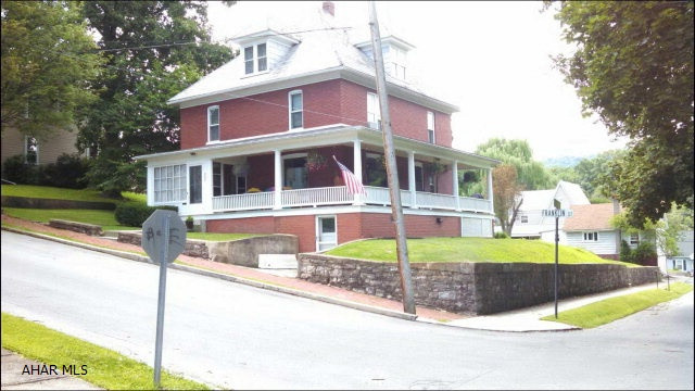 MOTIVATED SELLER! HUGE updated brick home on corner lot in Spring Cove School District. This home features original hardwood flooring, molding, pocket doors and a beautiful wrap around porch. This property also features a second, flat, lot across the street with a detached 2 car garage. Don't miss this amazing home! Call listing agent for your showing today!
