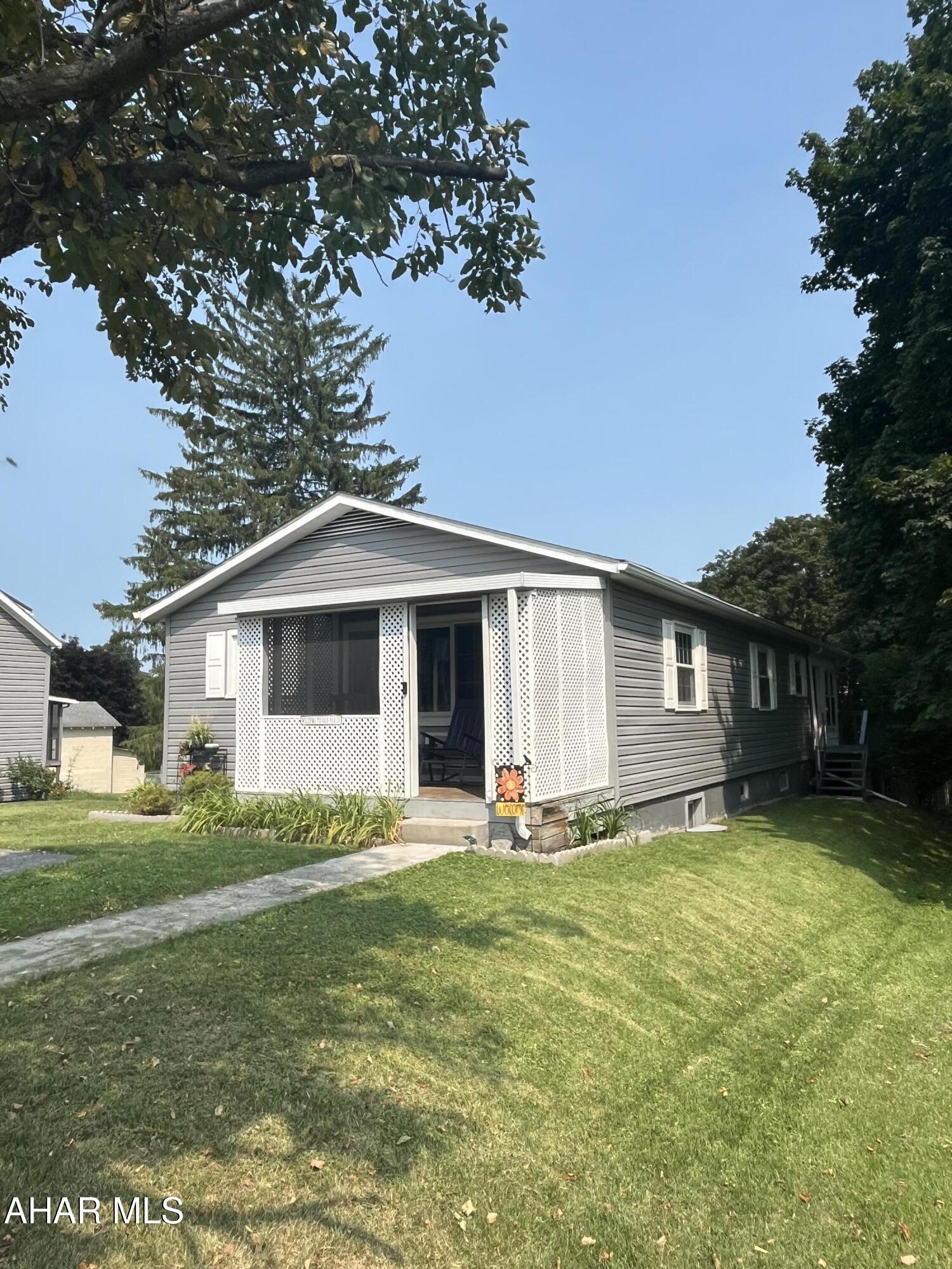 Located in the heart of Bedford Borough, this well-maintained 2-bedroom, 2-bathroom home offers the perfect blend of comfort, character, and convenience. Just minutes from Historic Downtown Bedford, you'll enjoy easy access to local shops, restaurants, parks, and community events. Inside, beautiful hardwood floors add warmth and character to the living room and guest bedroom, while the spacious primary bedroom features a large dual closet for plenty of storage. Relax year-round in the bright and inviting sunroom, or step outside to enjoy the large, fenced-in backyard with plenty of shade--perfect for entertaining, pets, gardening, or simply unwinding outdoors. A full unfinished basement provides abundant storage and endless potential for a workshop, home gym, or future finished living space. Don't miss your opportunity to make this inviting home your own in a desirable borough location!