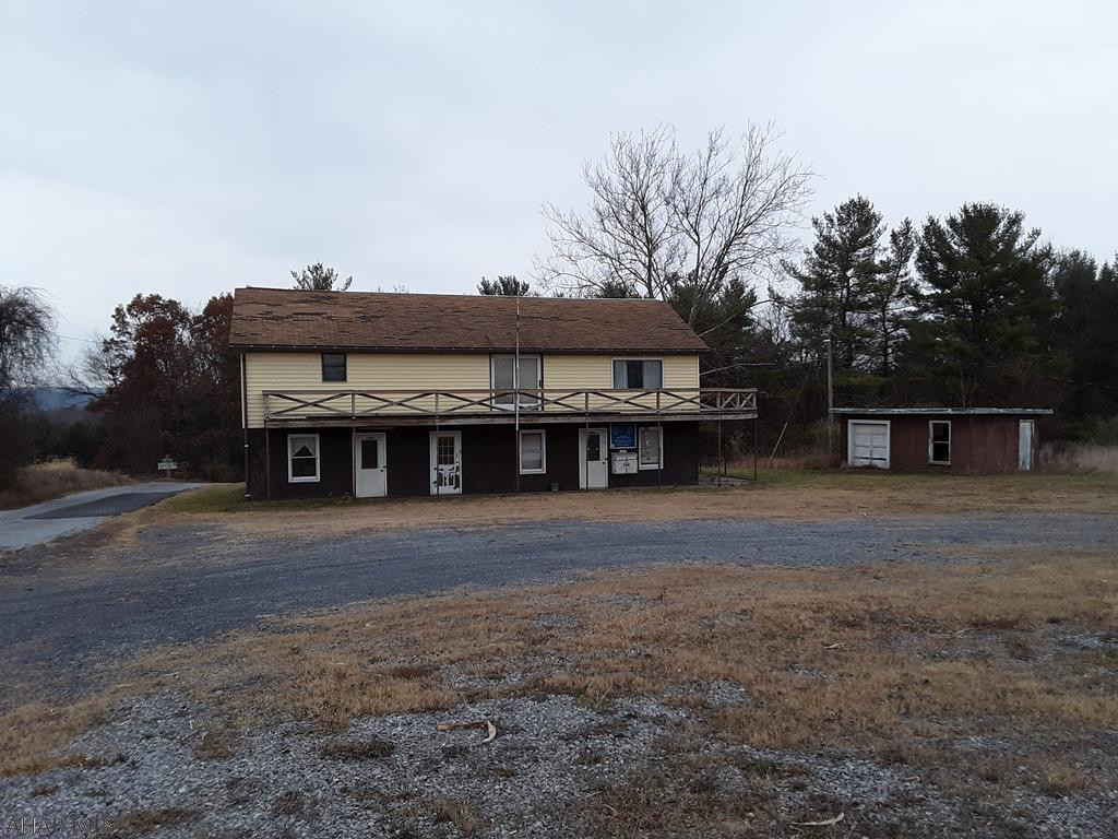 Formerly the Breezewood Camp Ground this RV park and campground has a lot to offer a new owner/investor!  The property is located in proximity to one of the busiest intersections in this part of the state.  The property has a main building that would serve as the park office and a retail space and also has an apartment.   There are RV hook ups with dump a station.  The back portion of the property can be used for rustic camp sites.  This property could also be used for hunting and out door recreation. Endless possibilities!