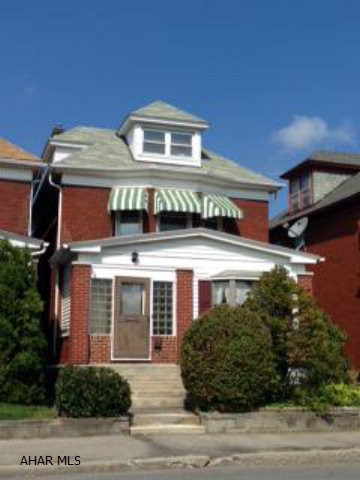 Good solid brick home with good solid mechanics. Natural oak throughout, lots of character. Very well maintained and move in ready! 2 car detached garage and fenced lot. Hardwood floors under carpet.