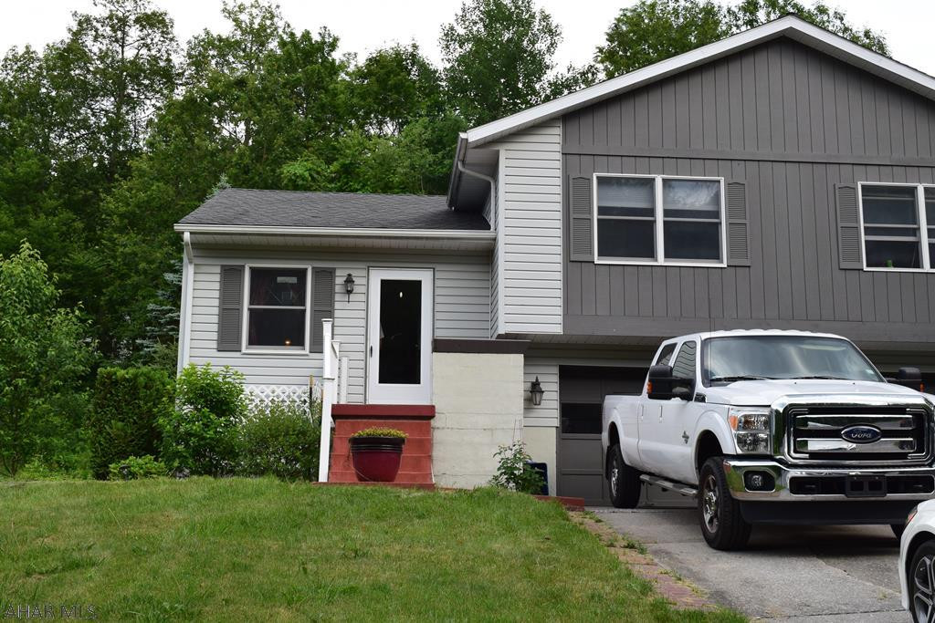 This great 2 bedroom half of a double home offers vaulted ceilings in the living room, a full finished basement and a large private deck. Two portions of the deck have been reinforced to accommodate hot tubs. The integral garage offers easy inside access to the home and a large driveway for additional parking. The split heat pump units provide air conditioning and a second heat source. Some furniture can be included or purchased. Seller is offering a $500 flooring credit. Call the listing agent today to schedule a showing.