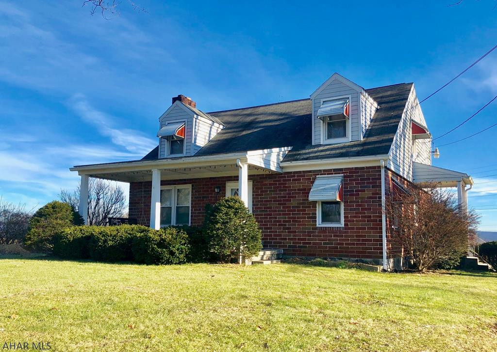 Lovely brick cape cod with tremendous views is situated on just under 1 acre in Bedford PA.  Spacious first floor with living, dining, kitchen and den.  Second floor has a wonderful layout with outstanding use of space.  Master with large walk-in closet and recently renovated bathroom.  2 car detached garage and a number of mechanical updates.  This one is sure to sell quickly, so call today for your own private showing!
