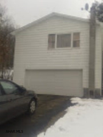 Price dramatically reduced motivated seller. This raised ranch built on 1979 is secluded but has easy access to Rt 22.  The house features oak kitchen cabinets, a propane woodstove, a concrete patio located under the deck that has a retractable awning and a paved driveway. There is a second well and sewer on the site.