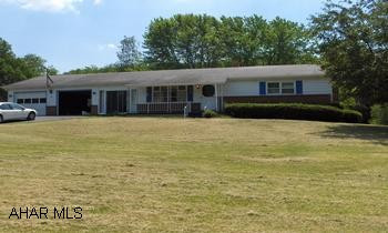 Rancher on one acre.  Finished basement, family room, sitting room, or bedroom.  Large rooms.  New hot/water tank, coalburning woodburner, modern kitchen cabinets, and breezeway finished. Rancher on one acre.  Finished basement, family room, sitting room, or bedroom.  Large rooms.  New hot/water tank, coalburning woodburner, modern kitchen cabinets, and breezeway finished.