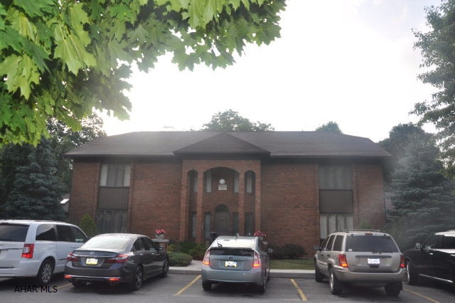 Beautiful and bright, 2 bedroom condo in desirable area. It offers beautiful hardwood, ceramic tile, sunken bonus room, and secured common area. It also has 1 1 car garage plus storage. It is located on the second floor and includes chairlift