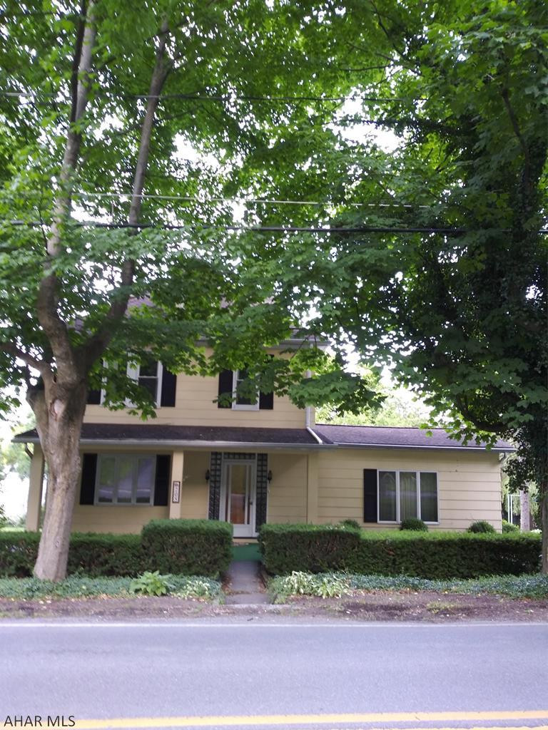 Well maintained home in nice friendly and settled neighborhood near Baker School and Logan Boulevard. Can use some updating, but is in good condition, has large family room with half bath access, sliding glass door to deck overlooking open back yard bordered by trees in rear. Central air conditioning and heating and recently replaced water heater are all natural gas units. Work bench in basement for your projects.  Modern kitchen with eat-in space, all appliances are included. Attic is finished but no HVAC. Near Shopping: Logan Valley Mall (Logan Valley Blvd & Plank Rd) is just over 1 mile away, as well as restaurants and other shopping centers near there. Come and make this your home!