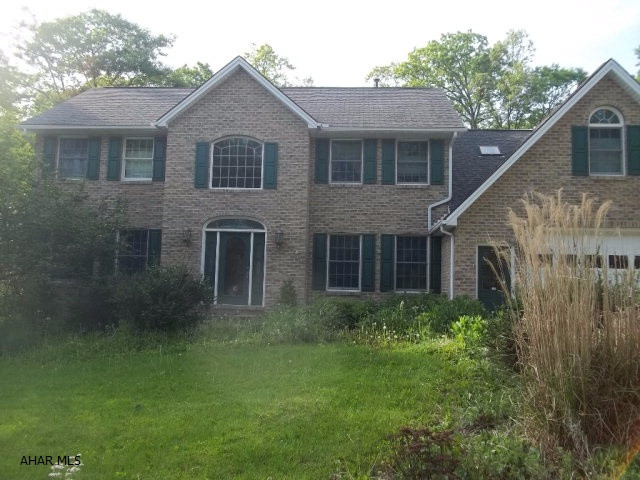 Location!location!Location! This home has endless potential. It is located in the prestigious Sylvan East Area. With a little time, this one can be your dream home. Four bedrooms, 3 full baths, 3 half baths, a wet bar, central air...  You name it, it's here! Highly motivated sellers, this home must sell! A home in this area will not last. Come take a look!