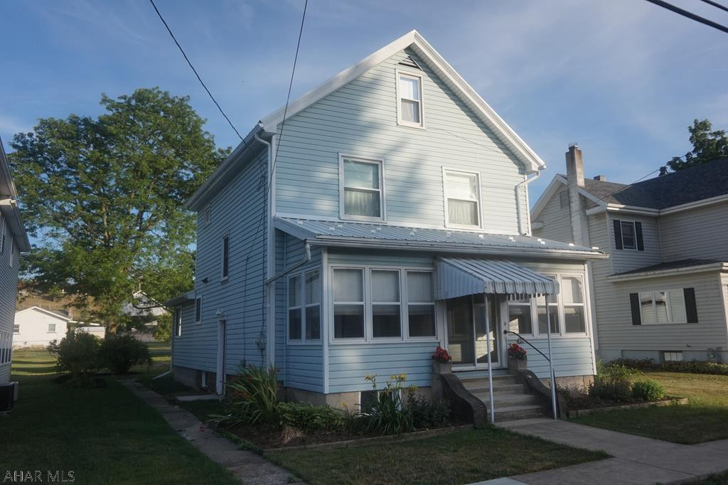 Solid, nice 3 bedroom, 1 full, 2 half baths,  two and a half story in the borough.  Spacious living room and kitchen, eat-in area in kitchen, enclosed front porch,  metal roof, nice sized lot.  Property being sold AS IS. Call listing agent for your viewing.