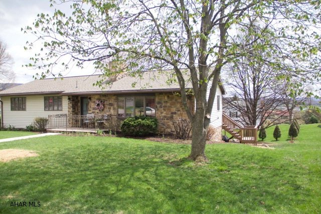 Large custom built ranch on a corner lot in desirable Highland Park.  Three large bedrooms, large living room, formal dining room with sliders onto a large deck, updated kitchen, original woodwork & hardwood under carpet, 2 fireplaces, super large family room with fireplace and French doors leading to a flagstone patio, great views, and new roof. Check this house out for great one floor living and convenient location.