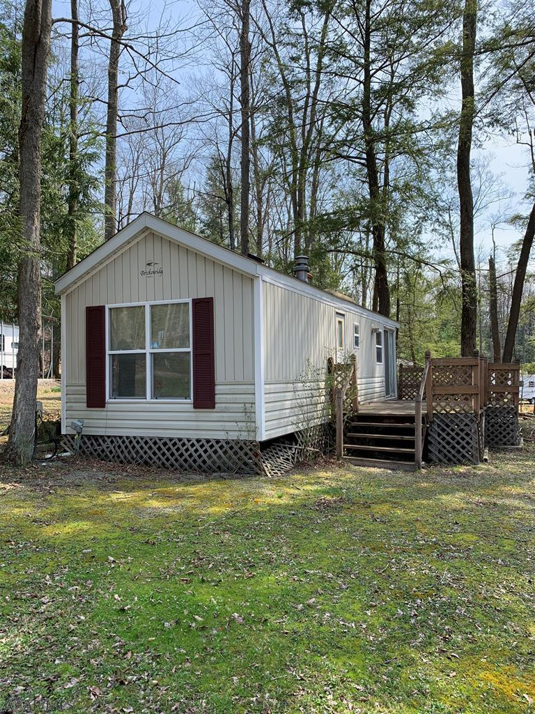 Attractive 1 BR park model on owned lot. nice deck, shed also, central air. All the amenities of Glendale Yearound. Heated swimming pool, tennis courts. Minutes from Rock Run and Prince Gallitzin State Park.